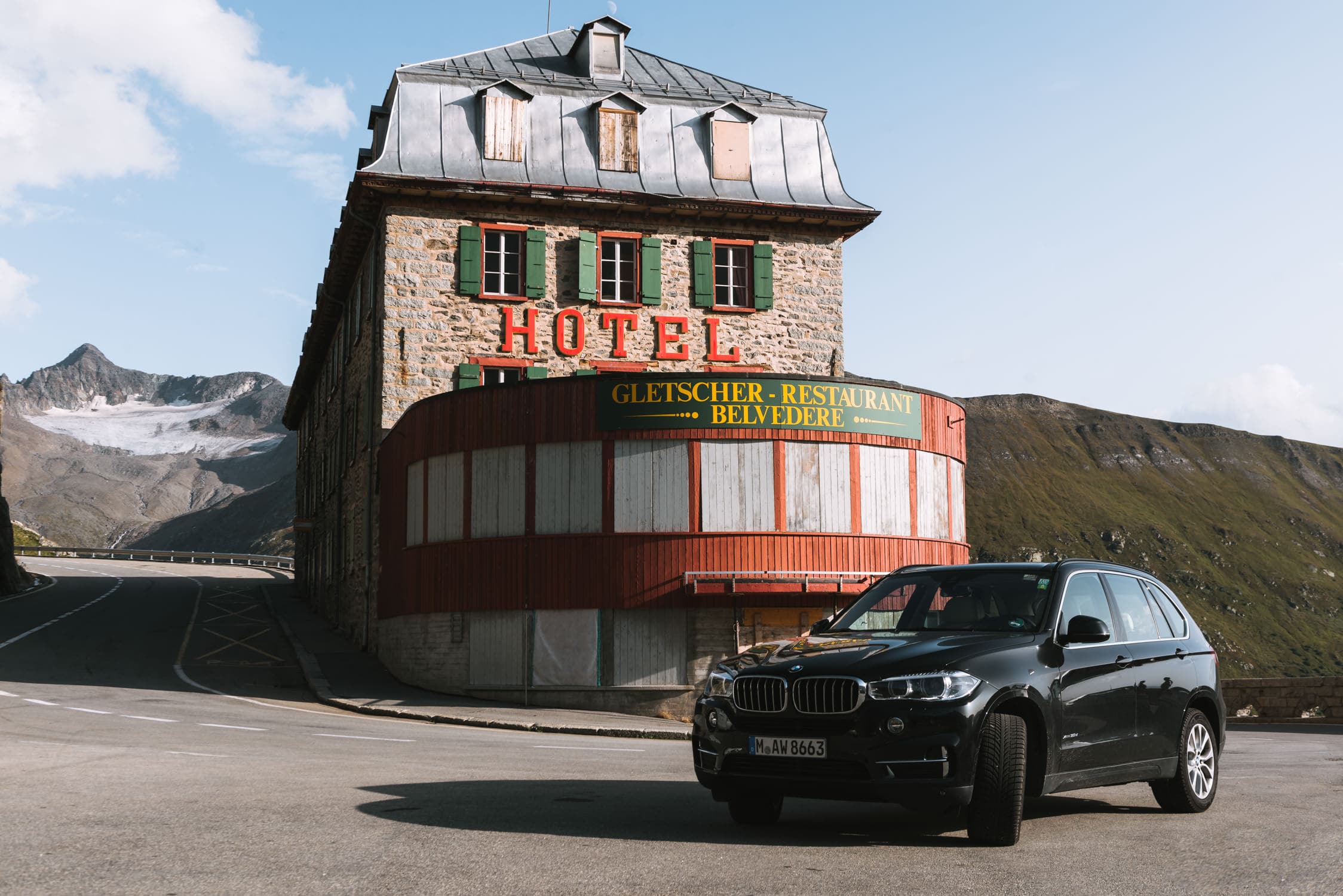 From a roadtrip through the Italian and Swiss alps for Sixt using a BMW X5 to drive through the mountain landscapes by photographer Michael Schauer