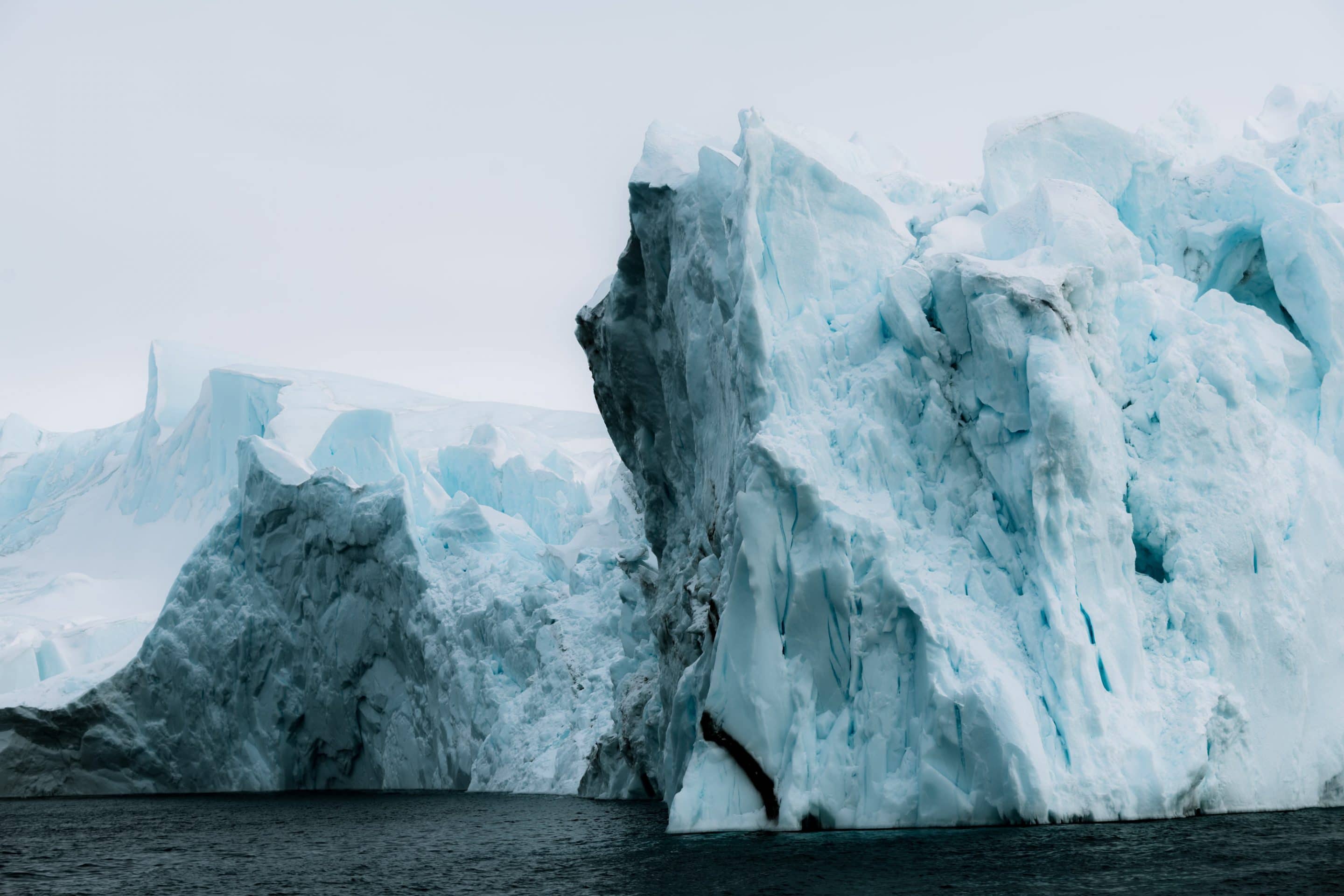 Minimalist fine art photographs of icebergs in Disko Bay, western Greenland by Michael Schauer