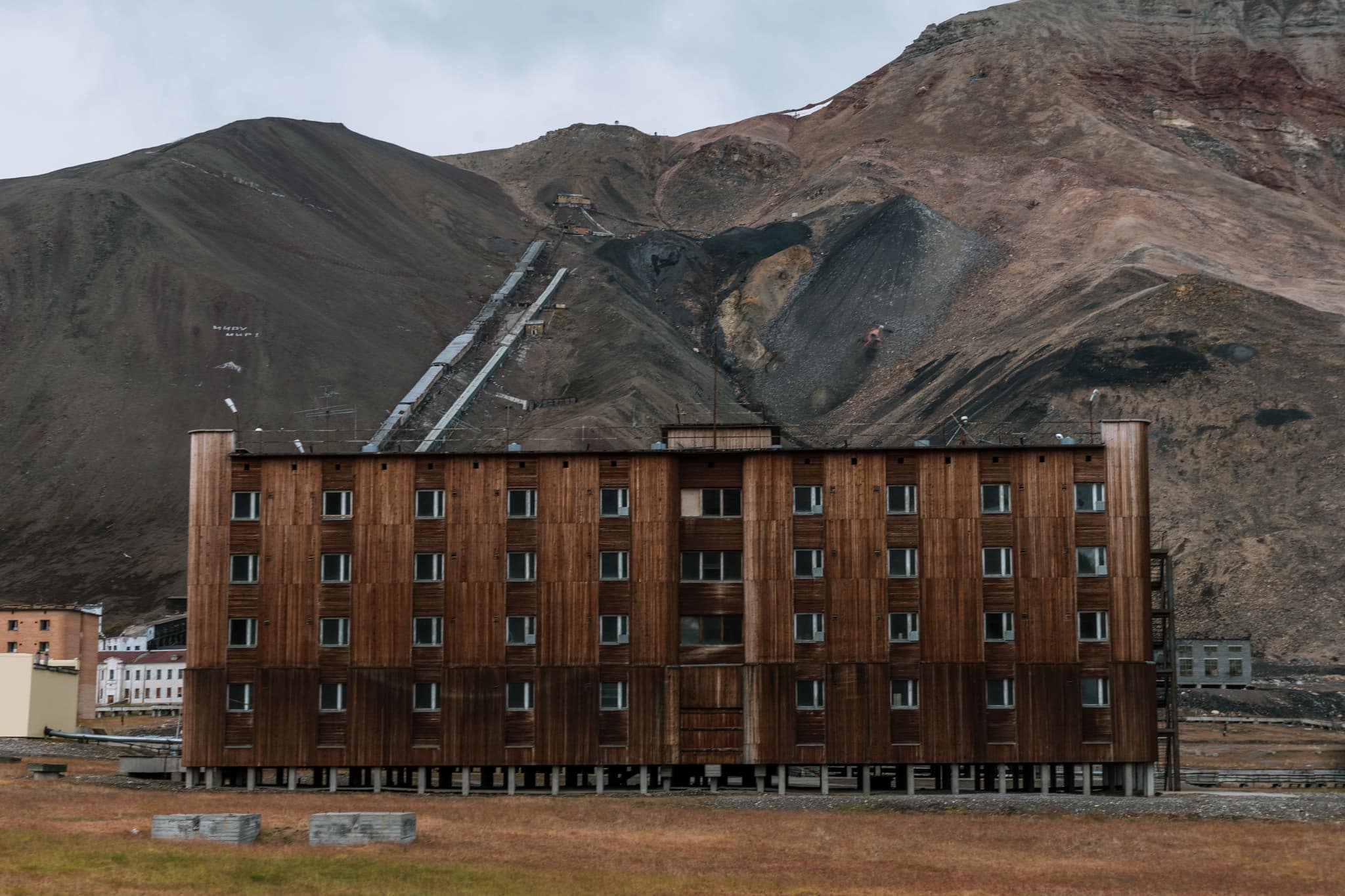 Pyramiden is a long lost settlement on the northern part of the Svalbard archipelago in northernmost Norway. It used to be a russian mining town but is now a time capsule and a lost place. By photographer Michael Schauer